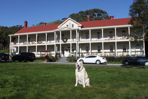 Kayla in front of the main admin building and Murray Circle Restaurant