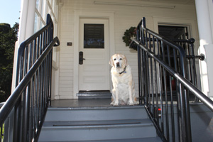 Kayla on the steps of her suite