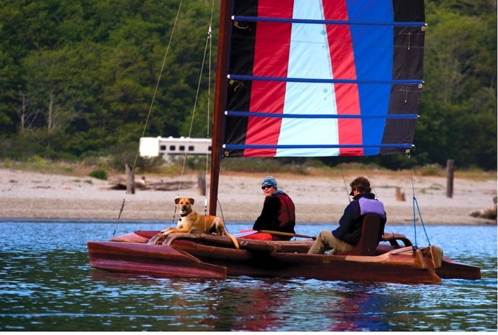 Dog and person in sailboat in Mendocino County